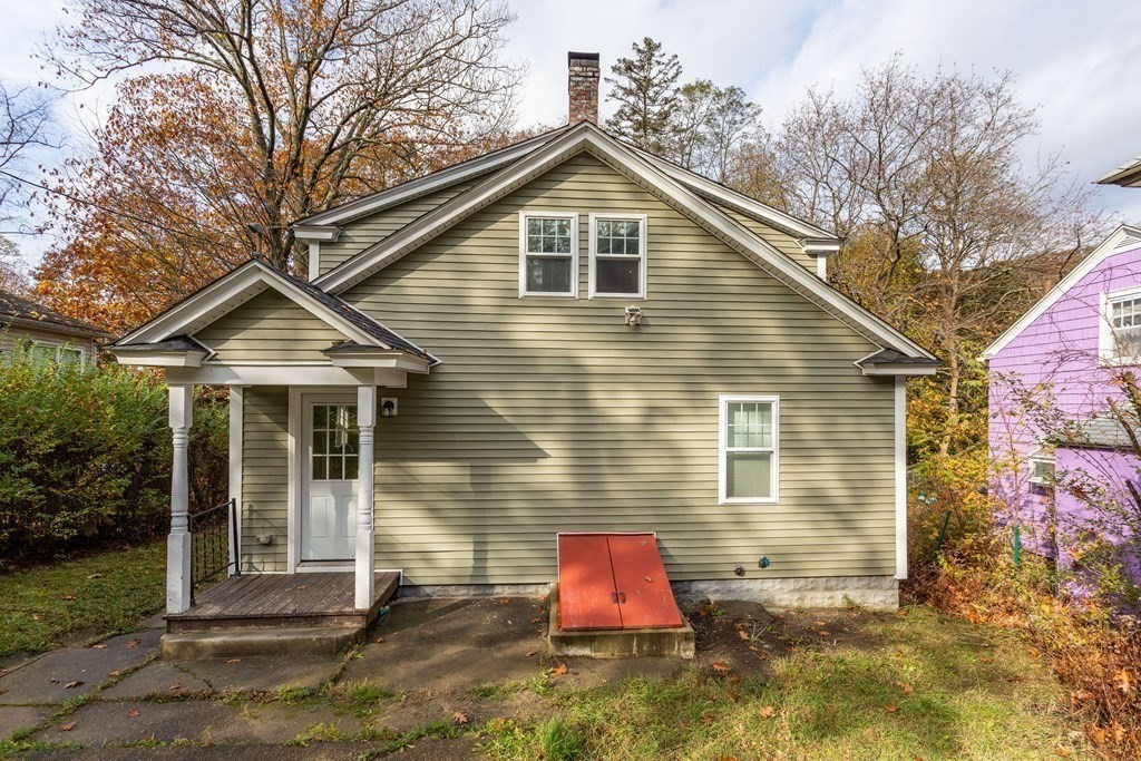 195 Eastern Avenue Worcester, MA 01605 - Photo 3 of 24 a front view of a house with a yard