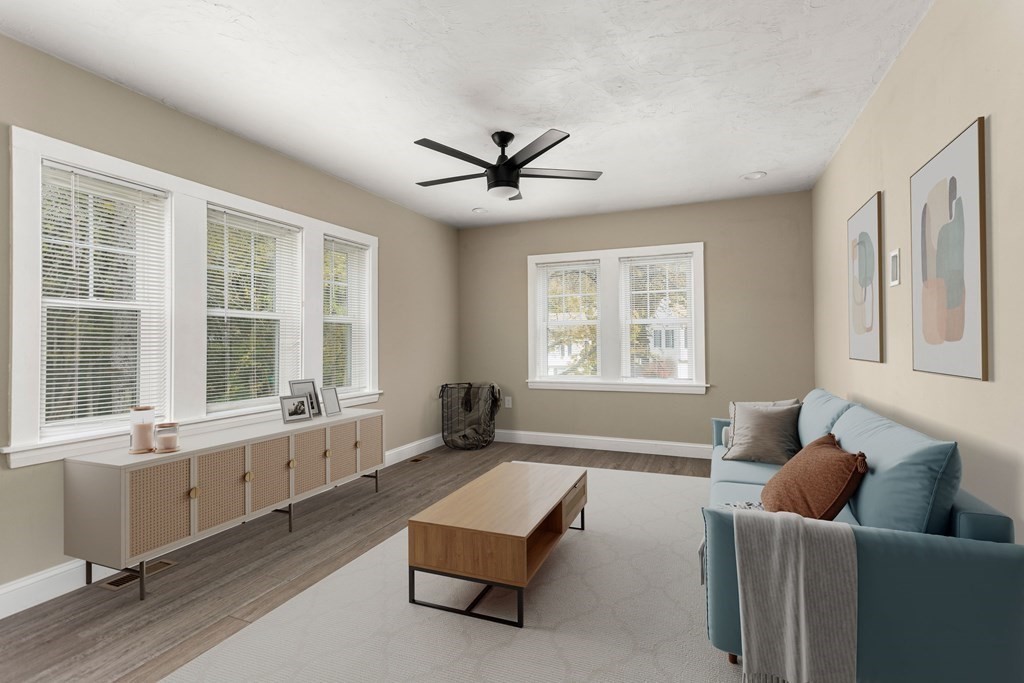 195 Eastern Avenue Worcester, MA 01605 - Photo 7 of 24 a living room with furniture and windows