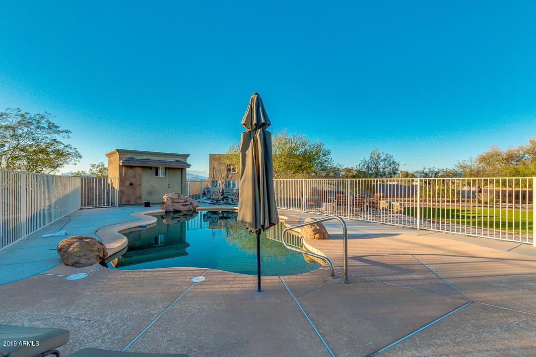 2816 West Joy Ranch Road Phoenix, AZ 85086 - Photo 38 of 51 Pool with Rock Features
