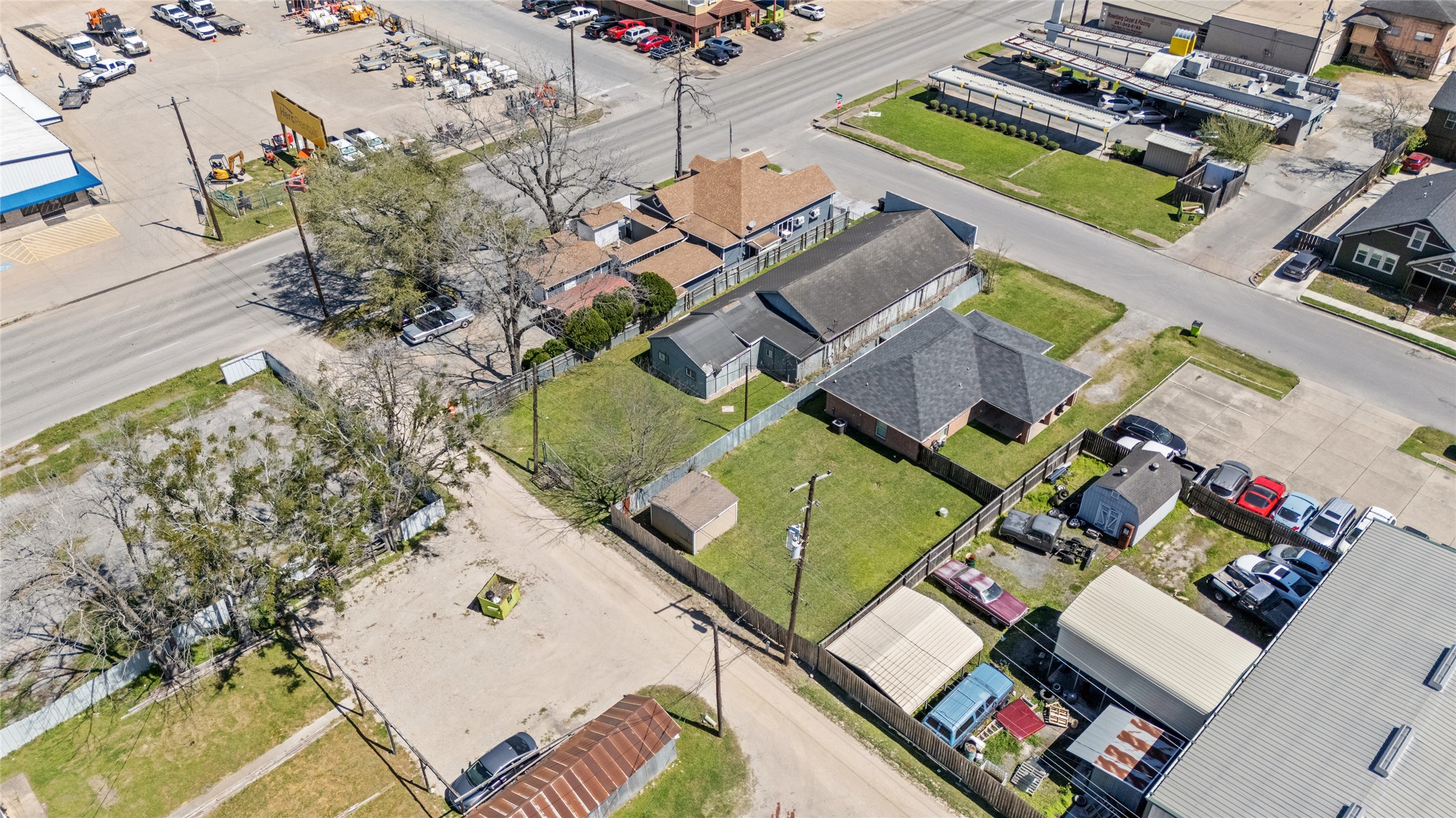 1004 Houston Street Rosenberg, TX 77471 - Photo 10 of 18 Direct front view of the building situated on the lot. Highlights the property's street-facing presence, offering excellent potential for future development or commercial use.