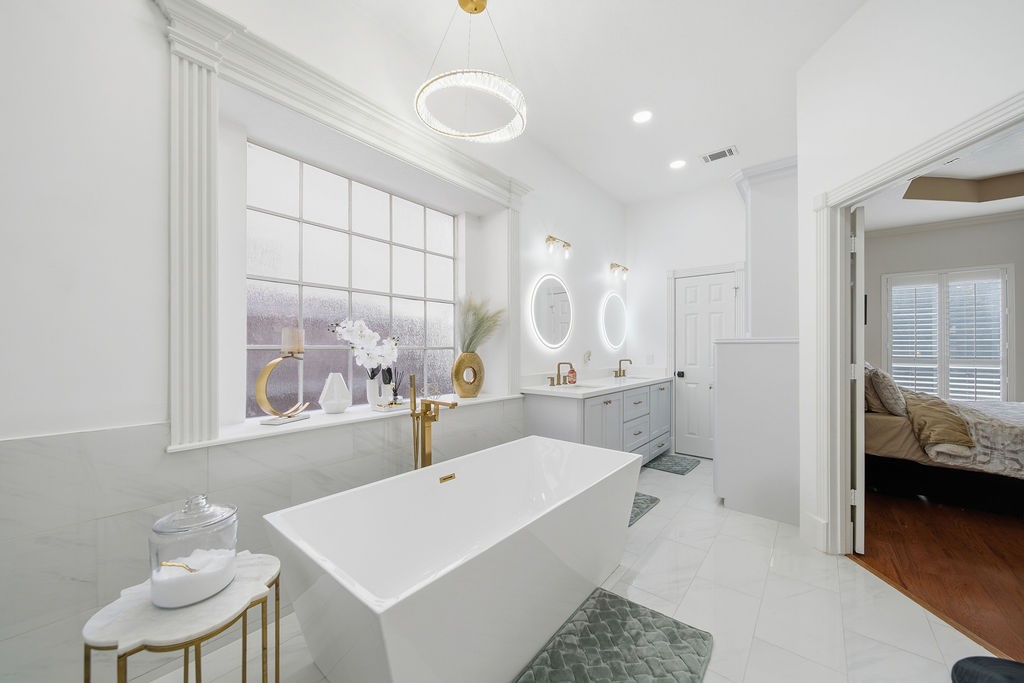 5811 Desert Oak Way Spring, TX 77379 - Photo 26 of 43 a view of a bathroom with dual sinks