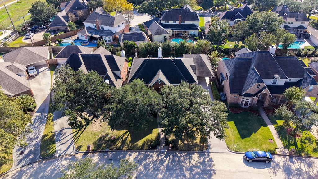 5811 Desert Oak Way Spring, TX 77379 - Photo 9 of 43 an aerial view of house with yard swimming pool and outdoor seating
