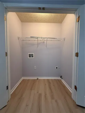 a view of a room with racks on the wall