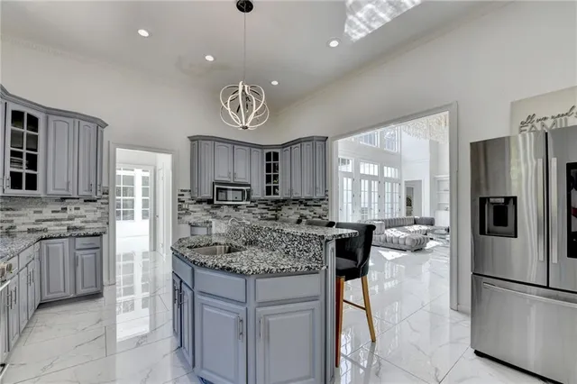 a bedroom with bed window and couch