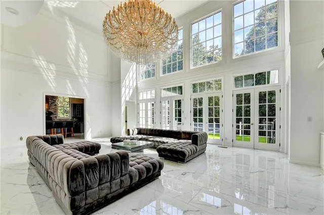 a view of a kitchen with a sink and a window