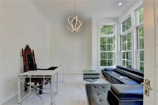 a bathroom with a granite countertop sink toilet a mirror and shower