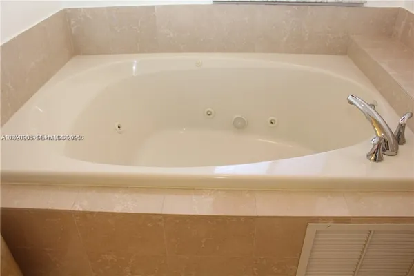 a view of a bathtub in a bathroom