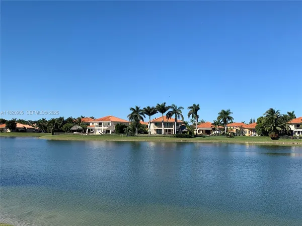 a view of a room with lots of trees and houses