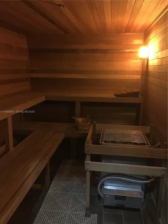 a stove top oven sitting inside of a kitchen