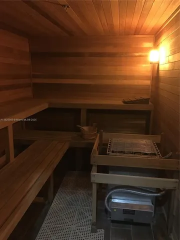 a stove top oven sitting inside of a kitchen