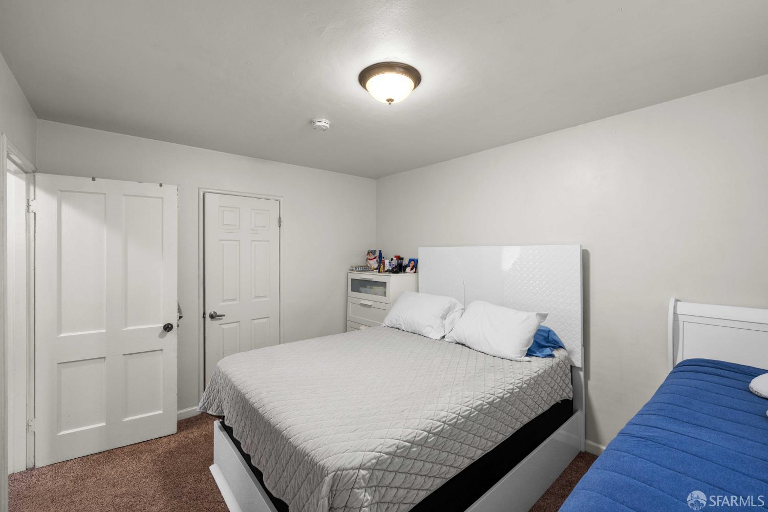 451 Rollins Road Burlingame, CA 94010 - Photo 11 of 23 a bedroom with a bed and a night stand