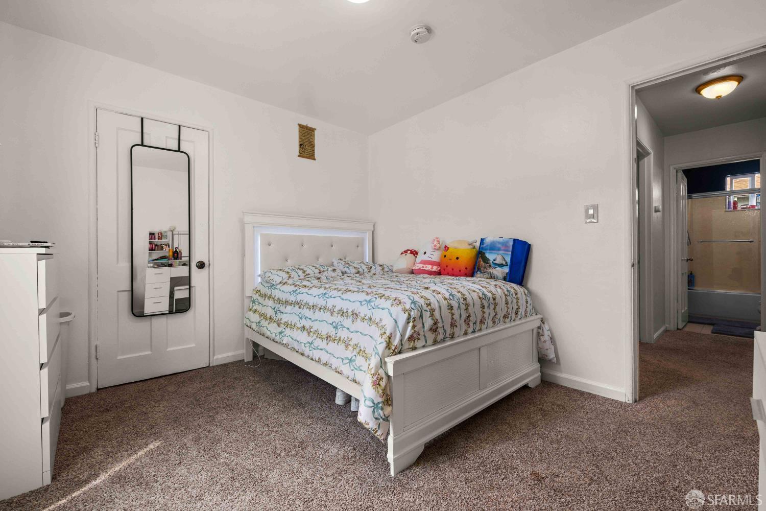451 Rollins Road Burlingame, CA 94010 - Photo 15 of 23 a bedroom with a bed and a table