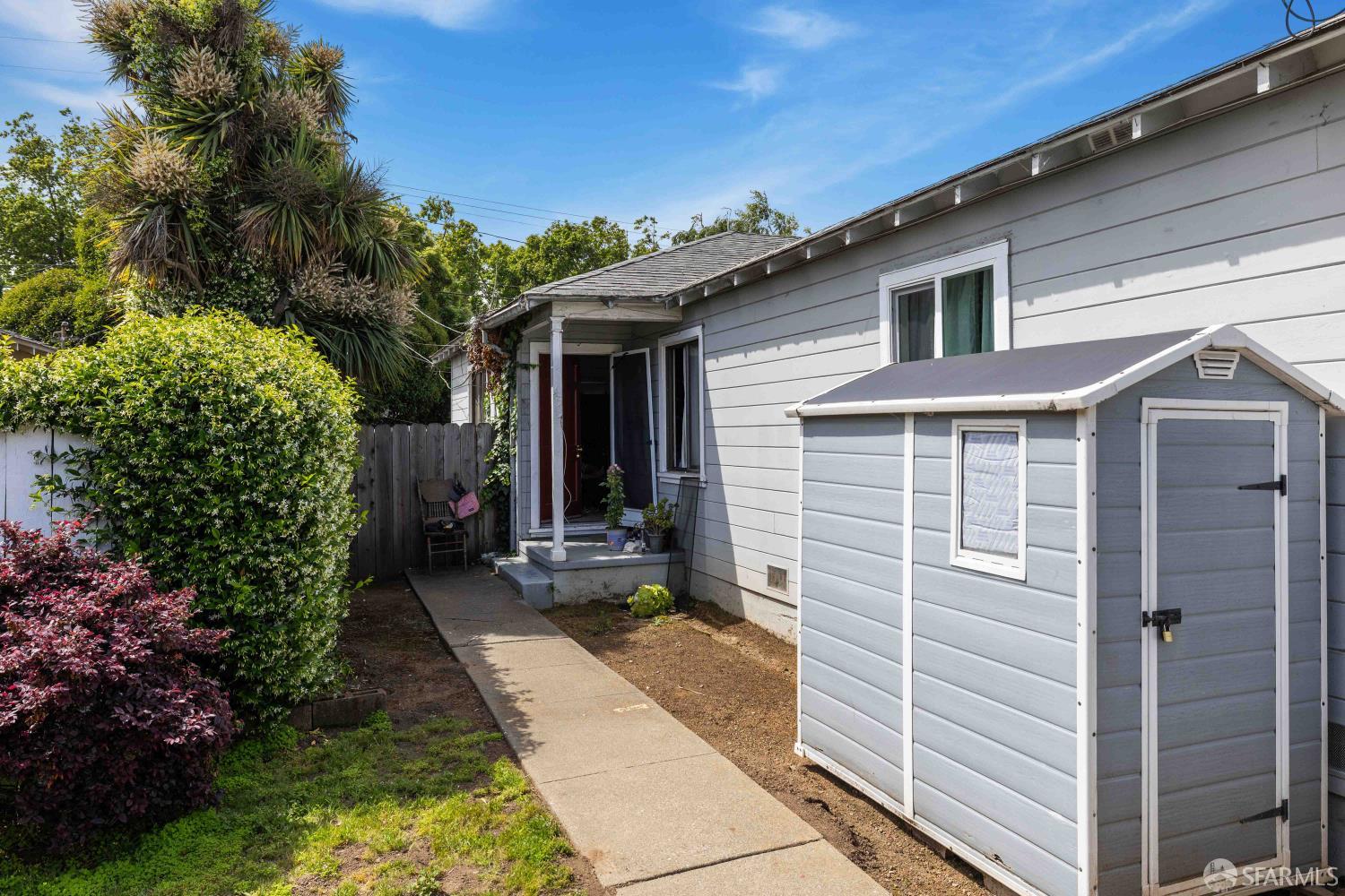 451 Rollins Road Burlingame, CA 94010 - Photo 20 of 23 a view of house with backyard and garden