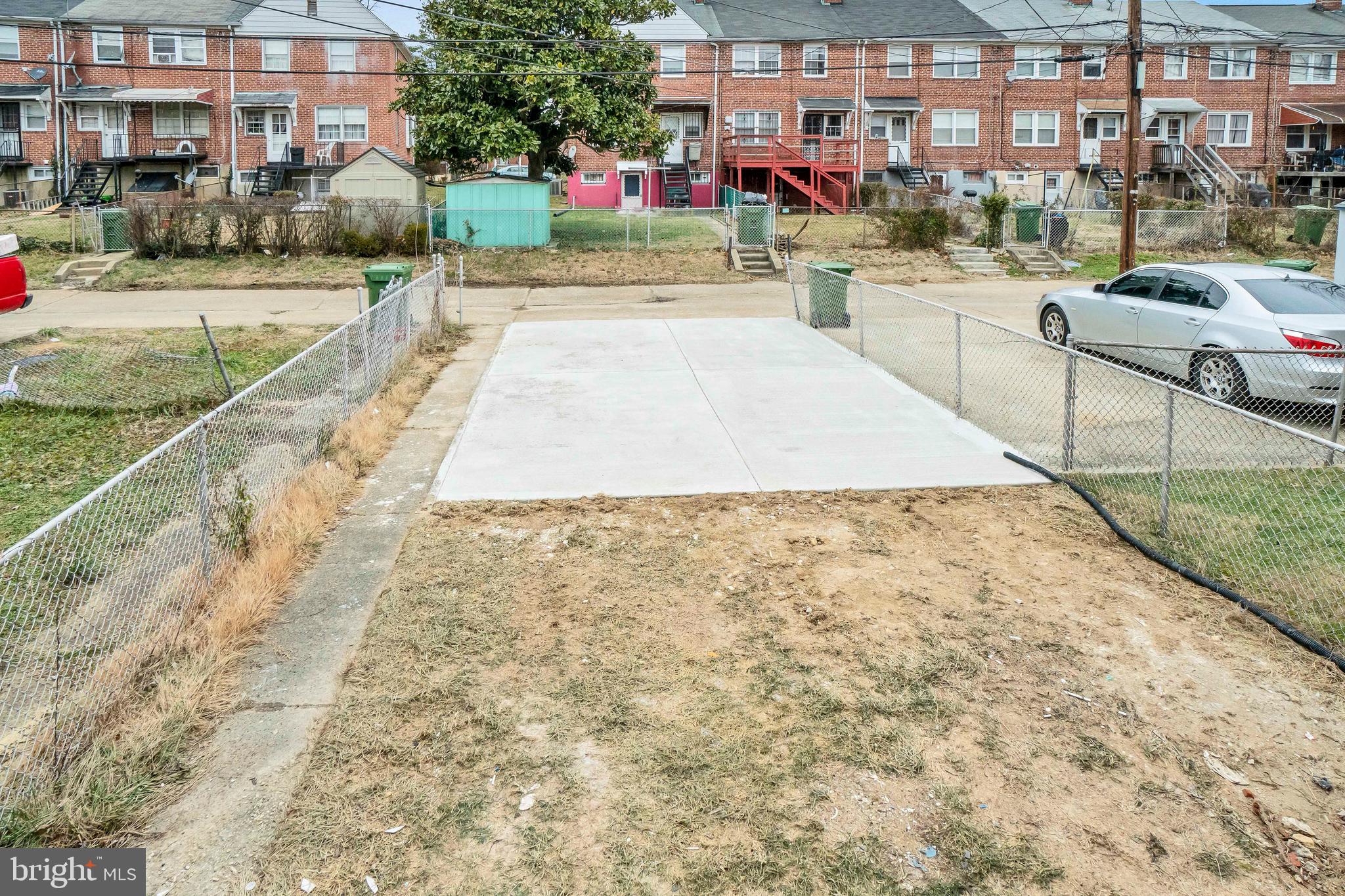 1326 Pentwood Road Baltimore, MD 21239 - Photo 34 of 35 Rear Exterior with Parking