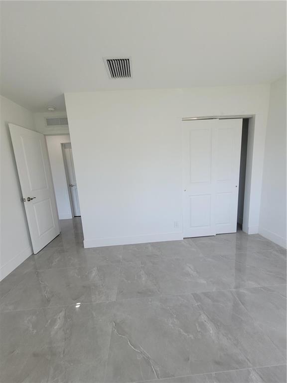 6041 Southwest 17th Street Miami, FL 33155 - Photo 19 of 26 a view of an empty room