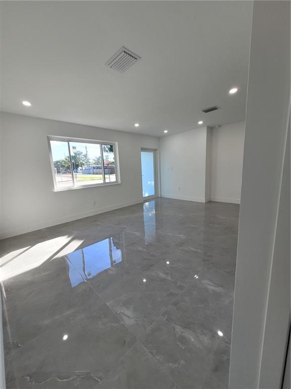 6041 Southwest 17th Street Miami, FL 33155 - Photo 21 of 26 wooden floor in an empty room with a window