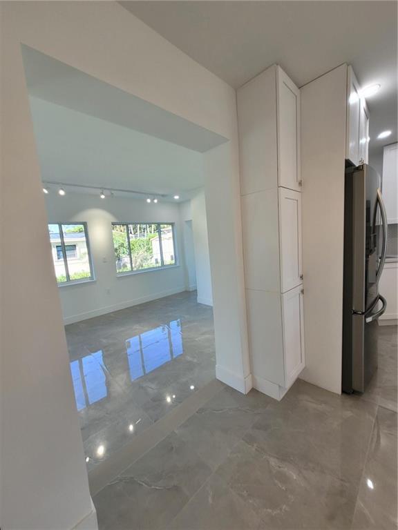 6041 Southwest 17th Street Miami, FL 33155 - Photo 5 of 26 a view of a livingroom with a staircase