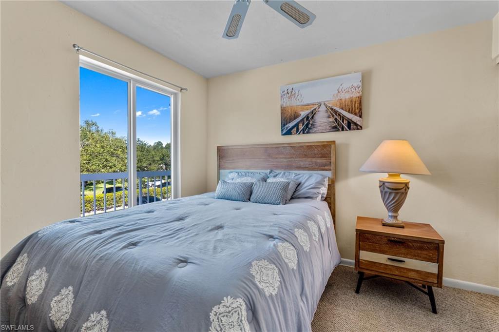 2155 San Marco Road, Unit 2204 Marco Island, FL 34145 - Photo 12 of 22 a bedroom with a bed and a window