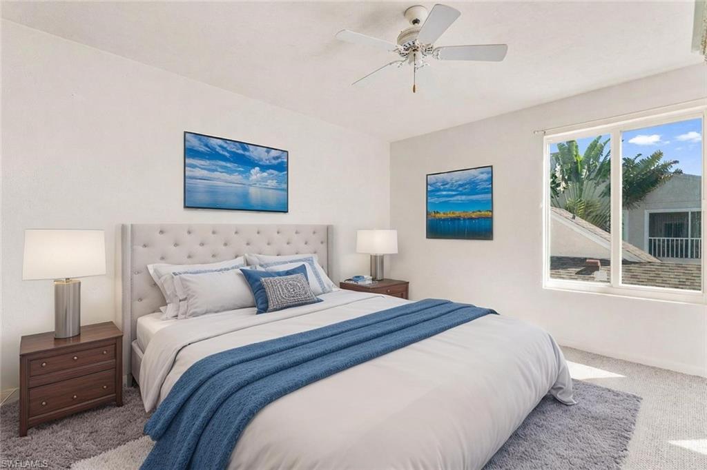 2155 San Marco Road, Unit 2204 Marco Island, FL 34145 - Photo 3 of 22 a bedroom with a large bed and a window