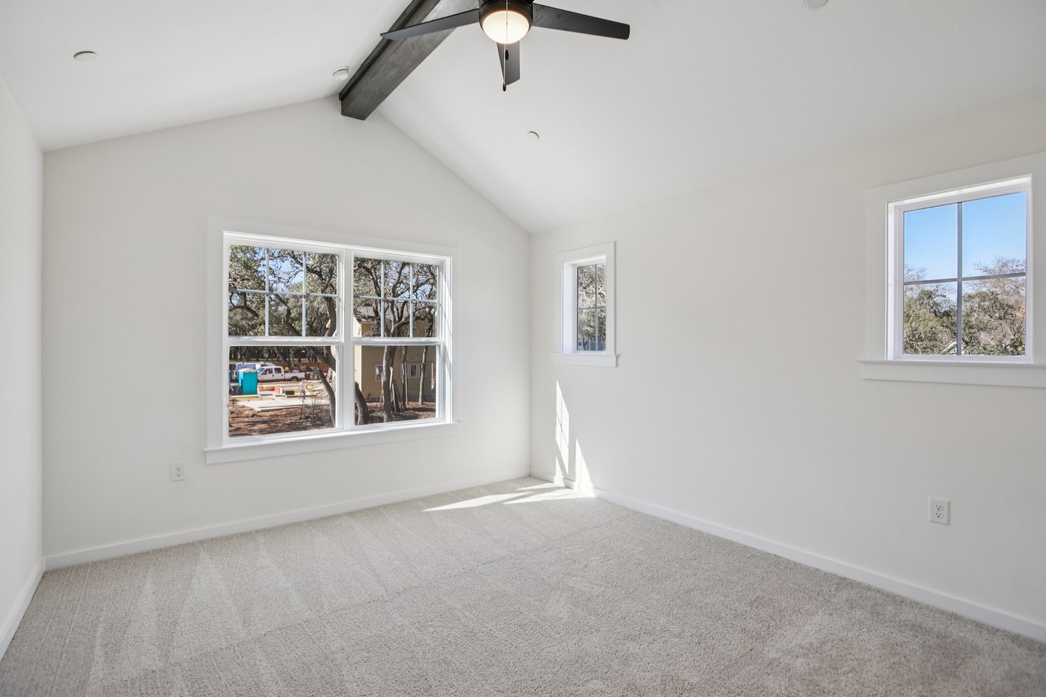 2414 Drew Lane, Unit 5 Austin, TX 78748 - Photo 16 of 24 Empty room with carpet flooring and ceiling fan