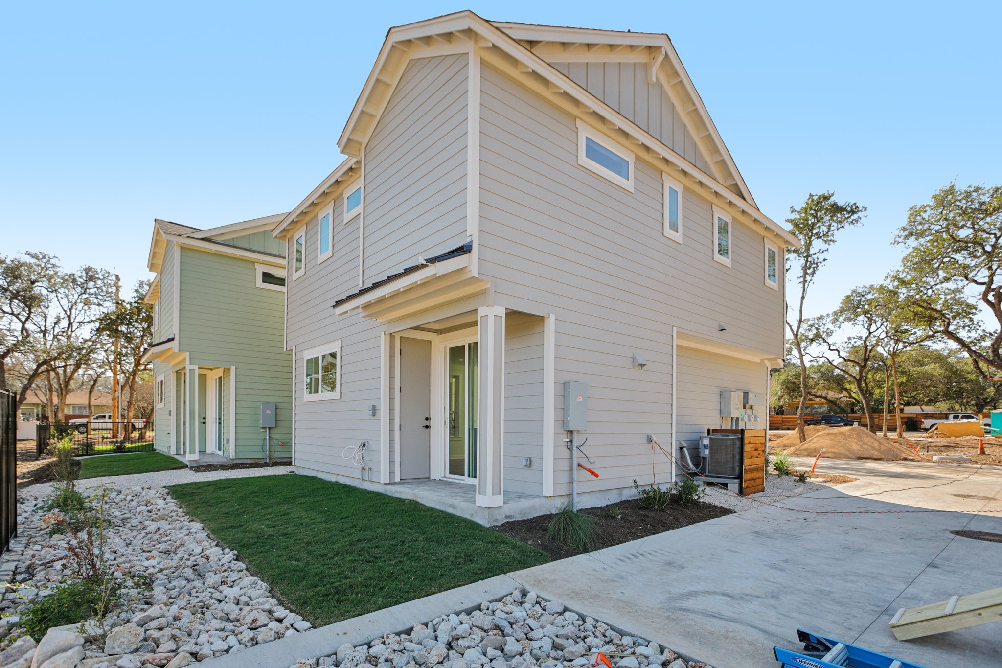 2414 Drew Lane, Unit 5 Austin, TX 78748 - Photo 24 of 24 Rear view of house with board and batten siding