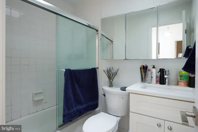 a bathroom with a toilet and a sink