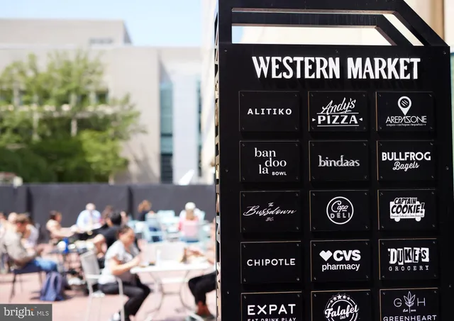 a view of street with stores