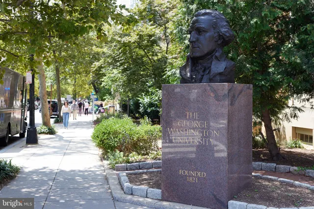 a view of a building with sitting area