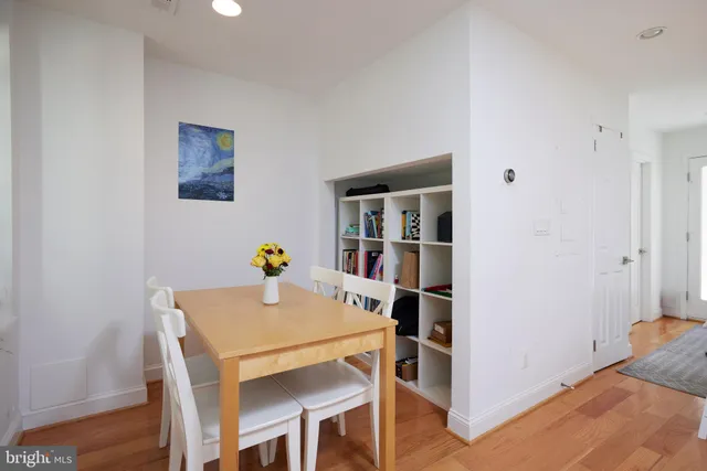a workspace with furniture and wooden floor
