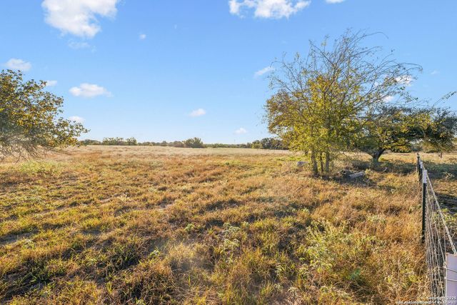 a view of outdoor space and a yard