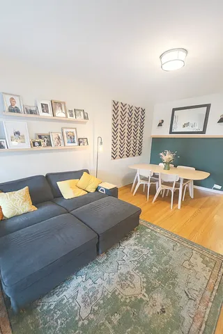 a living room with furniture and a table