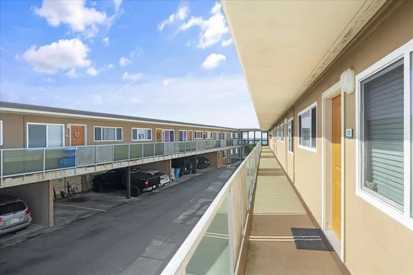 a view of swimming pool with seating area
