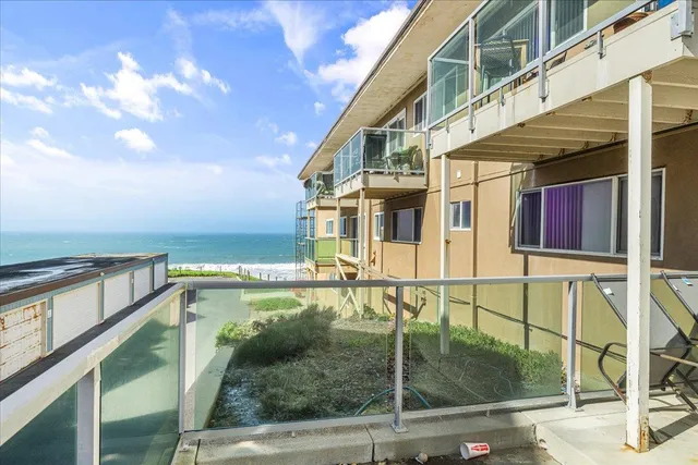 a view of a balcony with staircase