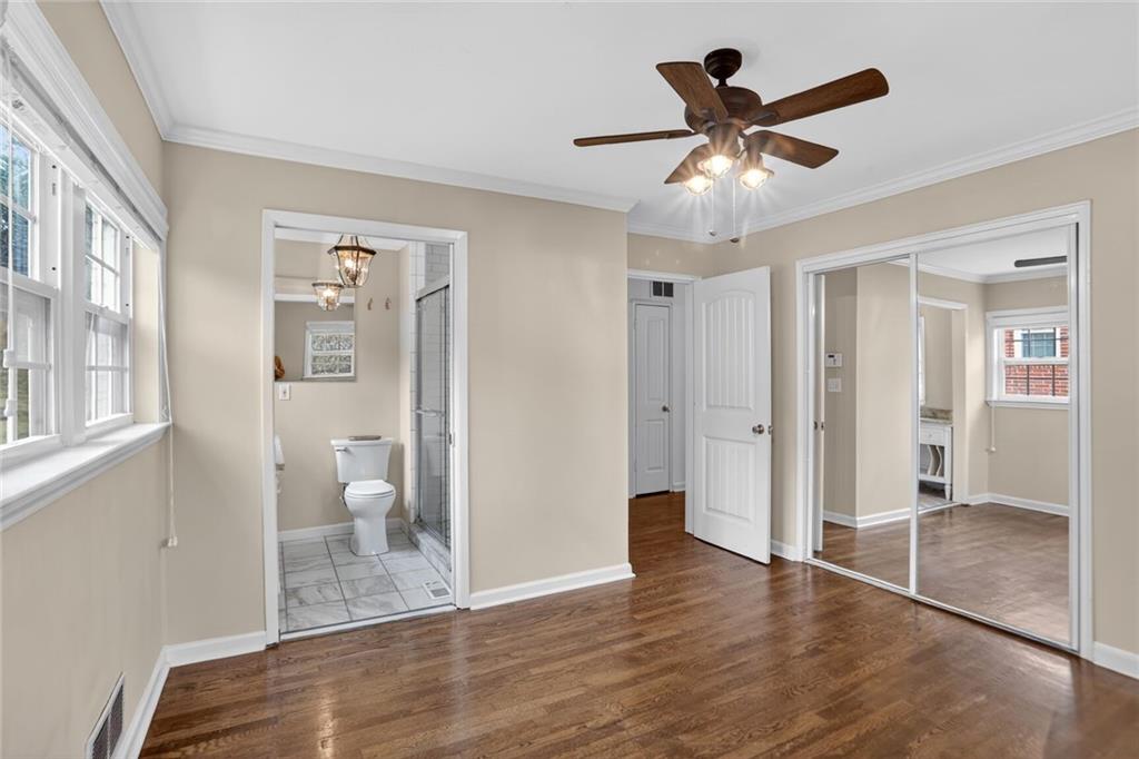 1127 Moores Mill Road Northwest Atlanta, GA 30327 - Photo 11 of 20 a view of an empty room and window