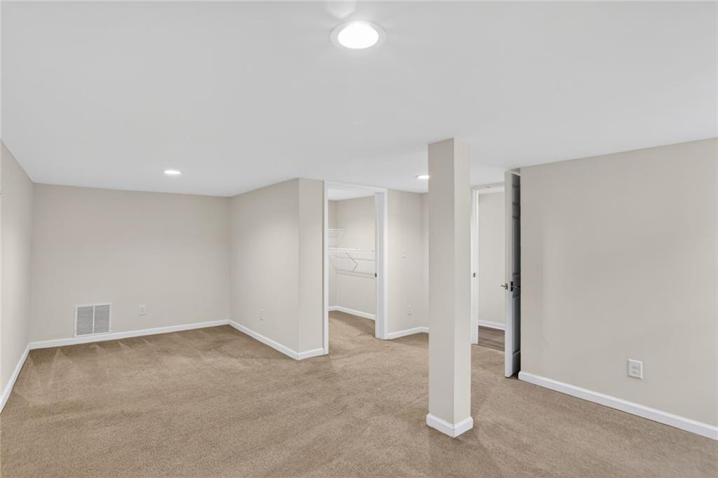 1127 Moores Mill Road Northwest Atlanta, GA 30327 - Photo 19 of 20 a view of an empty room