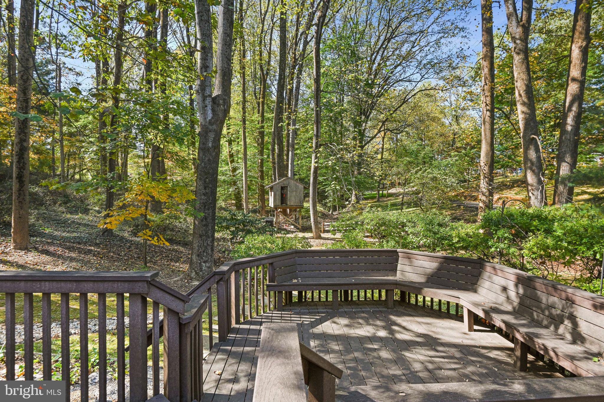 11273 Waples Mill Road Oakton, VA 22124 - Photo 11 of 75 a view of a sign board with large trees