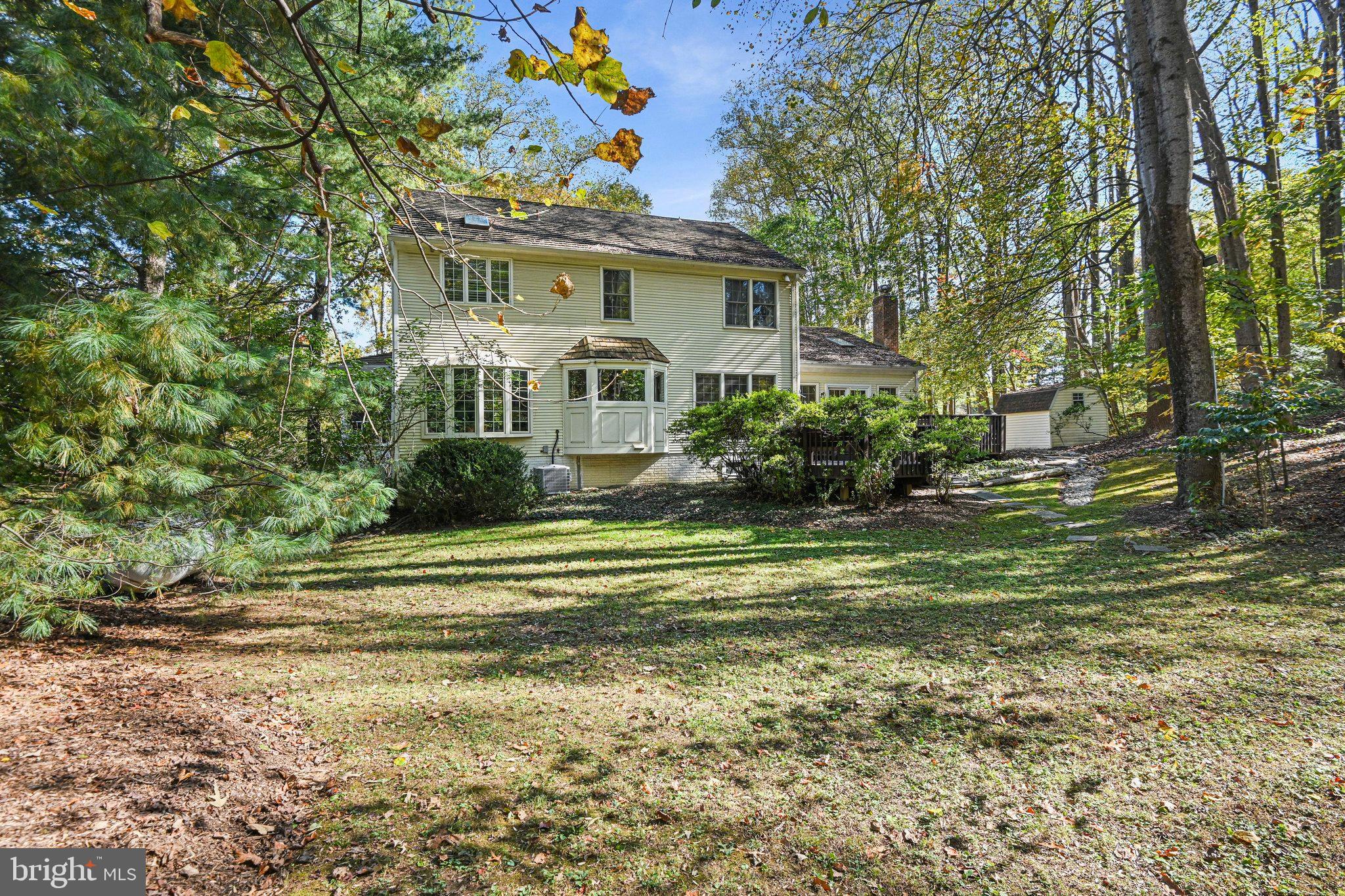 11273 Waples Mill Road Oakton, VA 22124 - Photo 13 of 75 a front view of a house with a garden