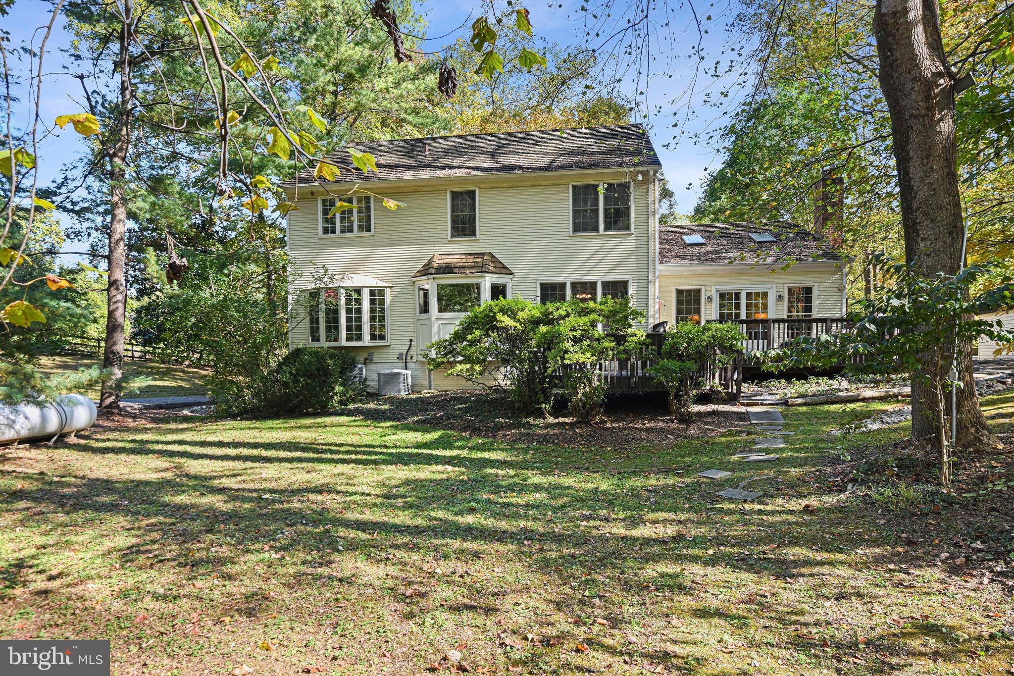 11273 Waples Mill Road Oakton, VA 22124 - Photo 15 of 75 a front view of a house with a garden