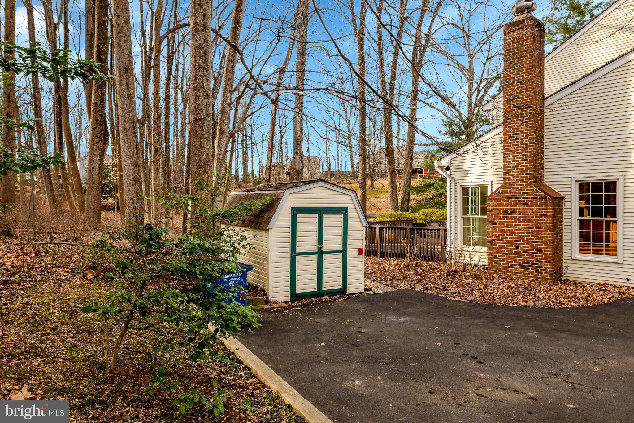 11273 Waples Mill Road Oakton, VA 22124 - Photo 26 of 75 a front view of a house with a yard