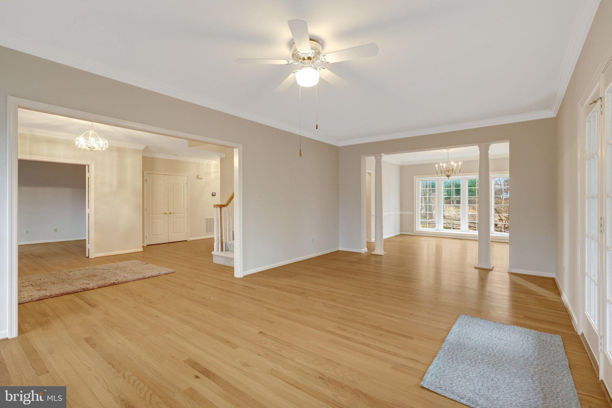 11273 Waples Mill Road Oakton, VA 22124 - Photo 33 of 75 a view of empty room with wooden floor and fan