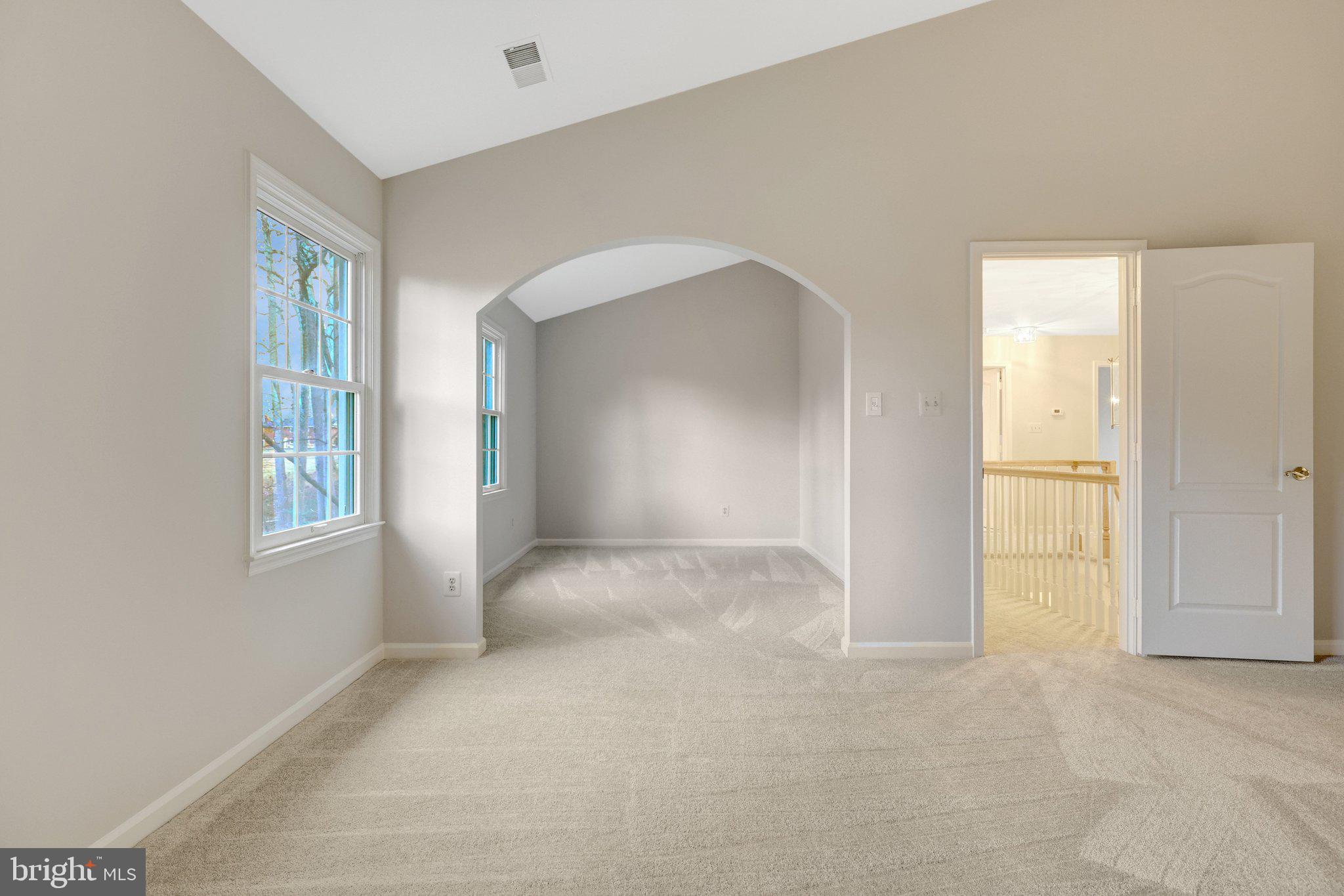 11273 Waples Mill Road Oakton, VA 22124 - Photo 56 of 75 an empty room with windows and closet