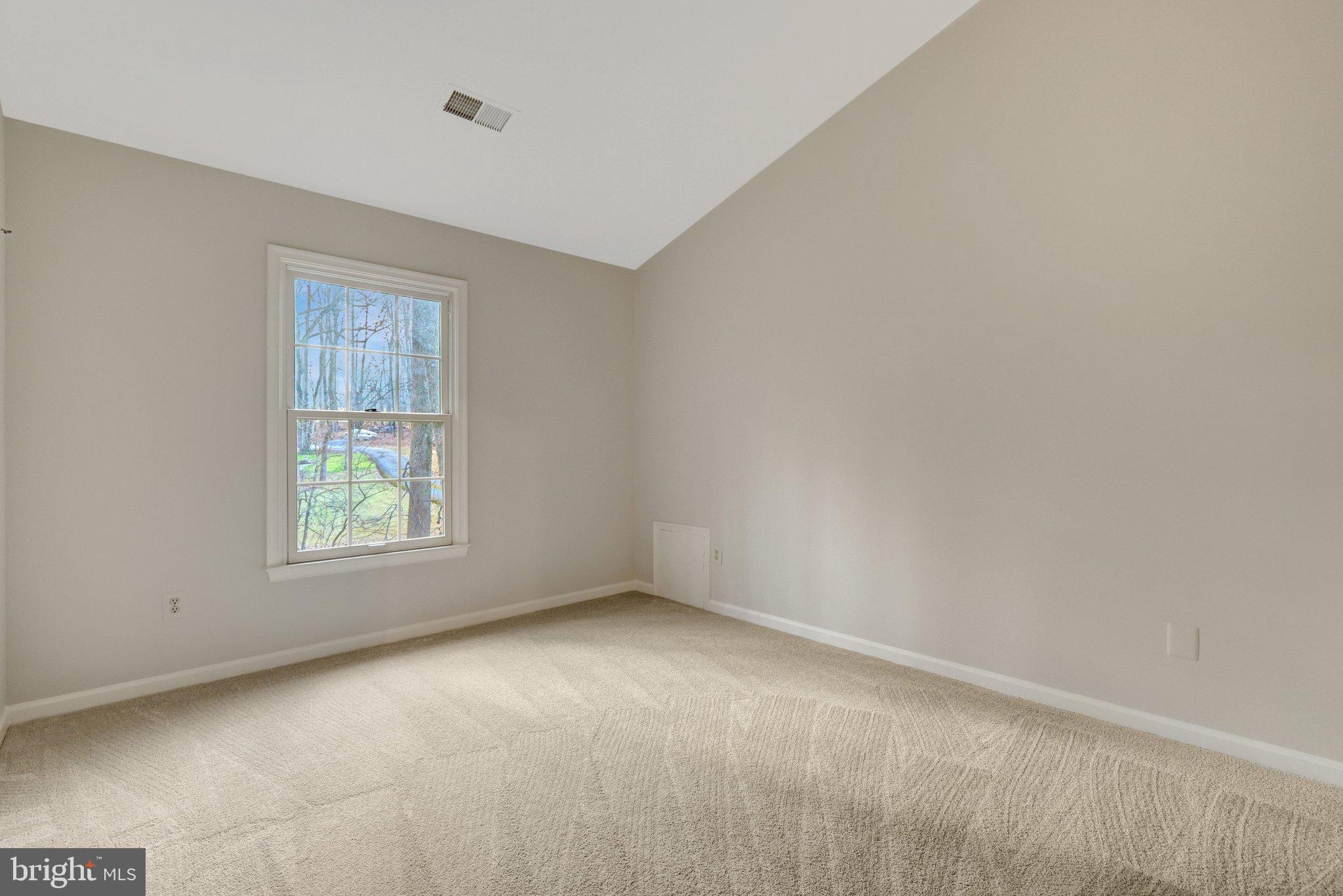 11273 Waples Mill Road Oakton, VA 22124 - Photo 68 of 75 an empty room with a window