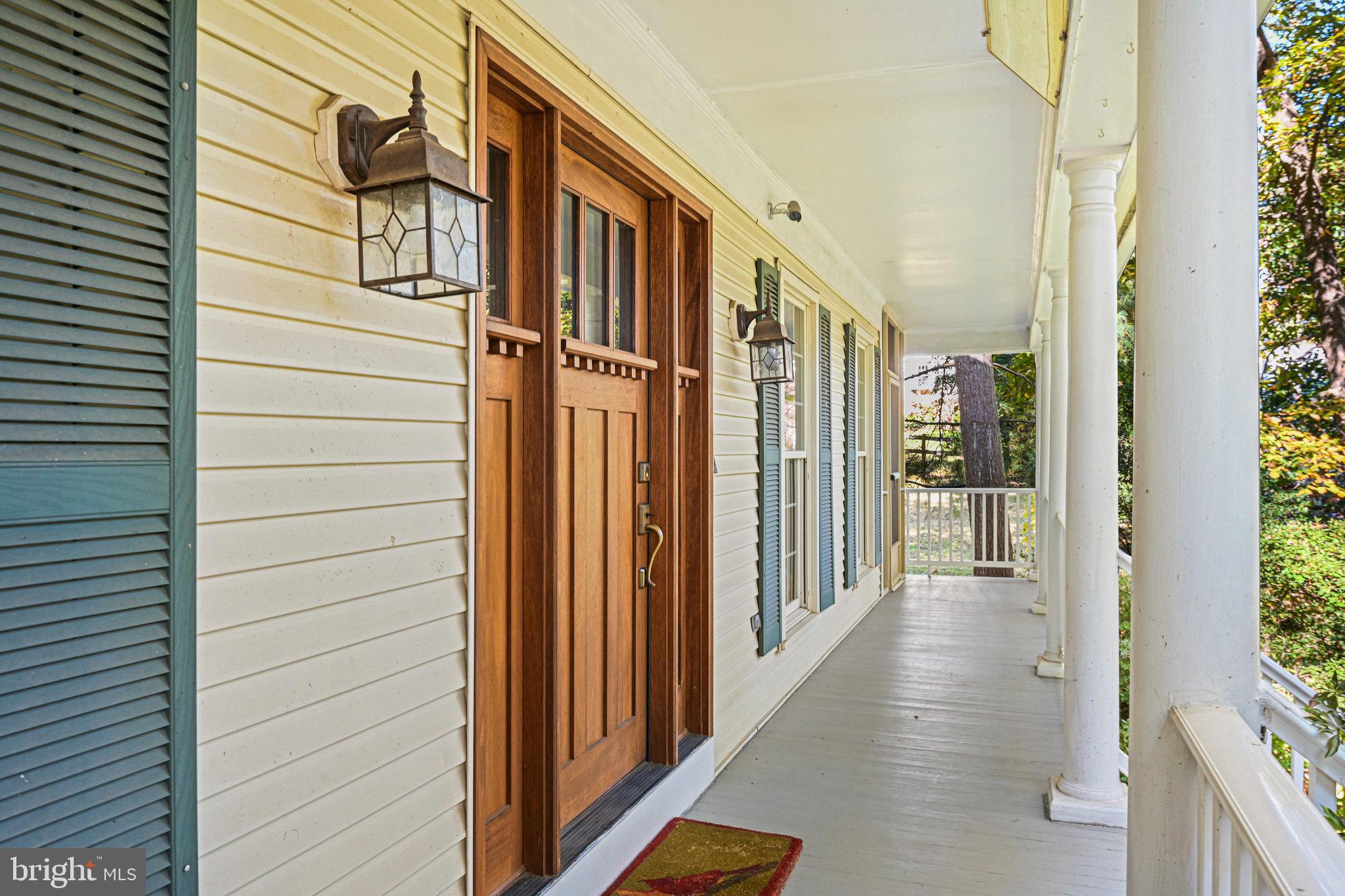 11273 Waples Mill Road Oakton, VA 22124 - Photo 8 of 75 a view of a porch with a door and wooden floor