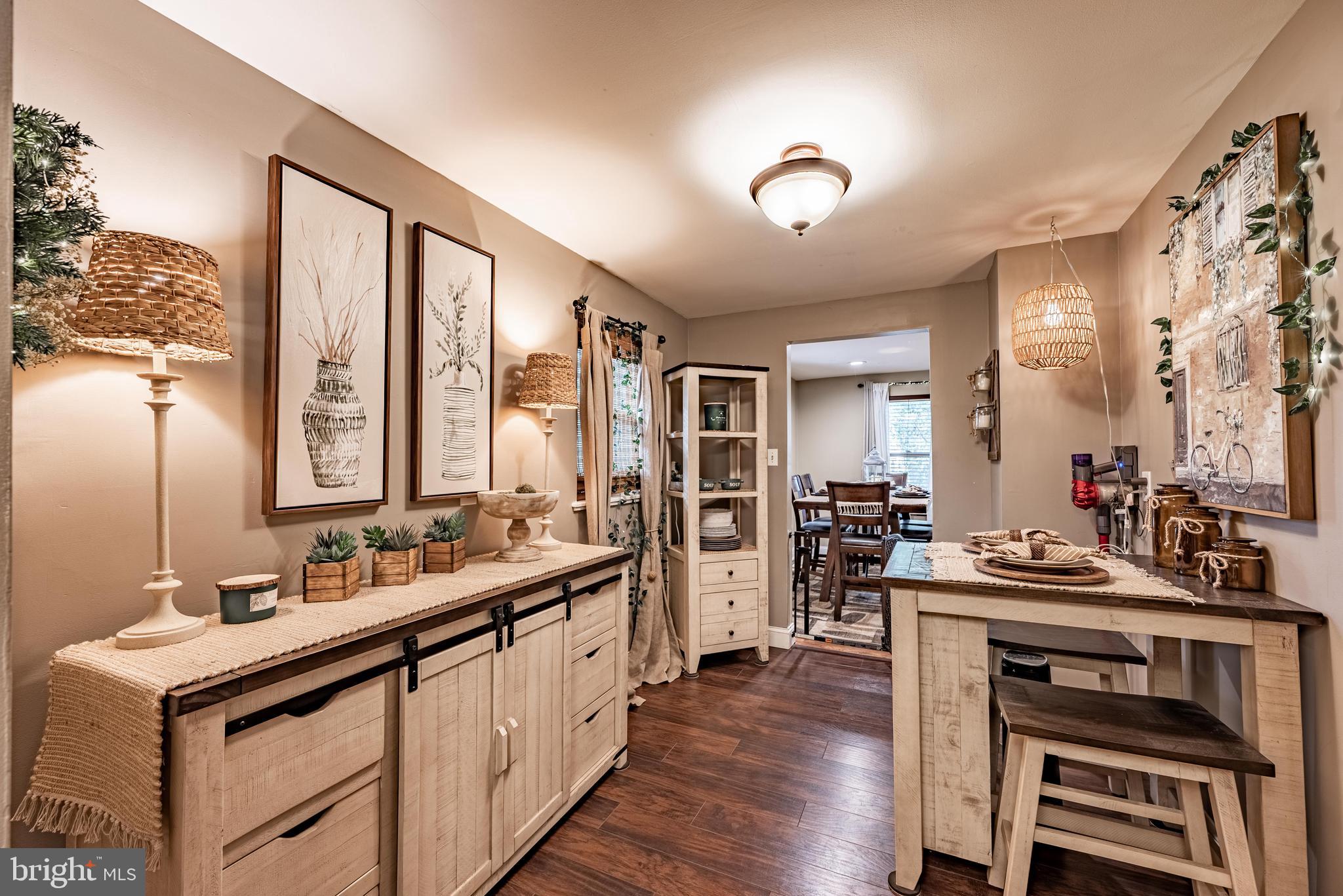 211 East Wheel Road Abingdon, MD 21009 - Photo 14 of 27 a kitchen with a sink stove and cabinets
