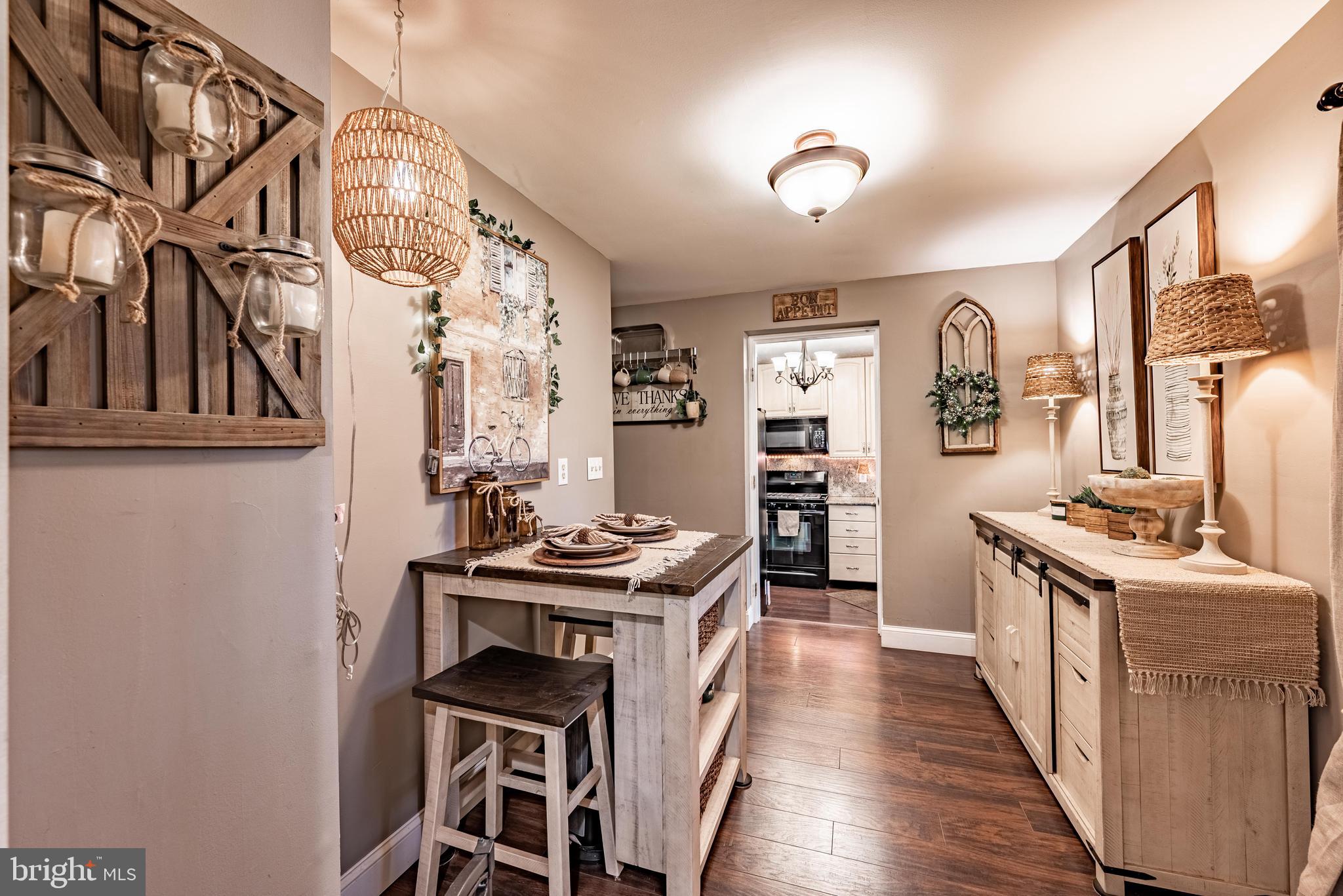 211 East Wheel Road Abingdon, MD 21009 - Photo 15 of 27 a kitchen with stainless steel appliances granite countertop a stove and a wooden floors