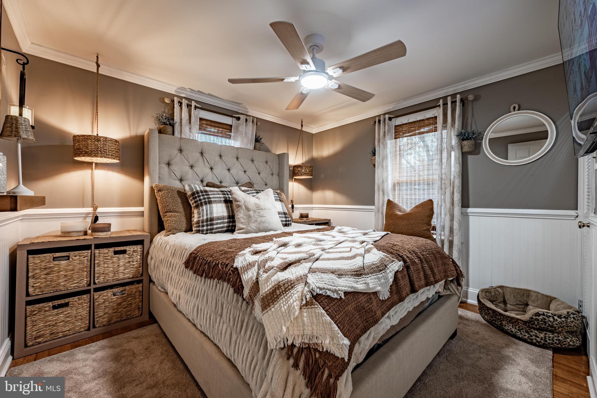 211 East Wheel Road Abingdon, MD 21009 - Photo 10 of 27 a bedroom with a bed and a chandelier