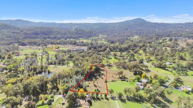 a view of residential houses with city view