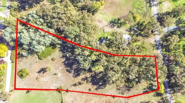 a view of a yard covered with snow