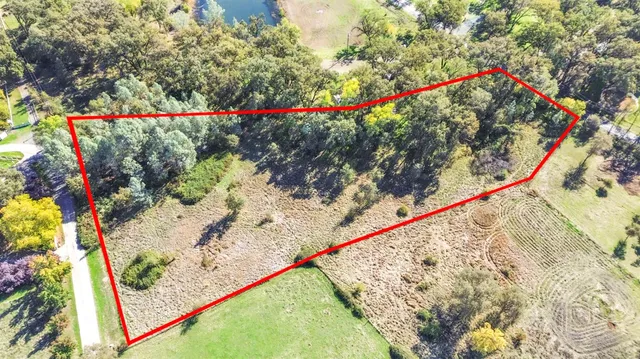 a view of a yard with an outdoor space