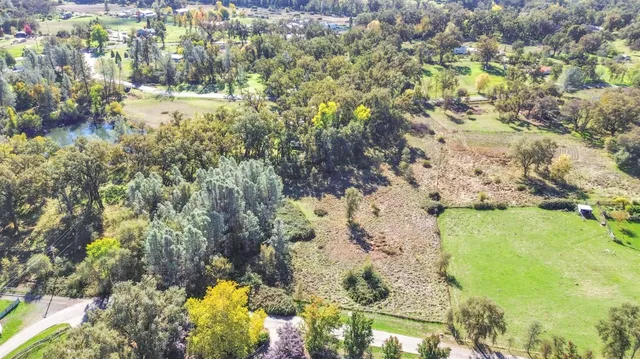 a view of swimming pool from a balcony
